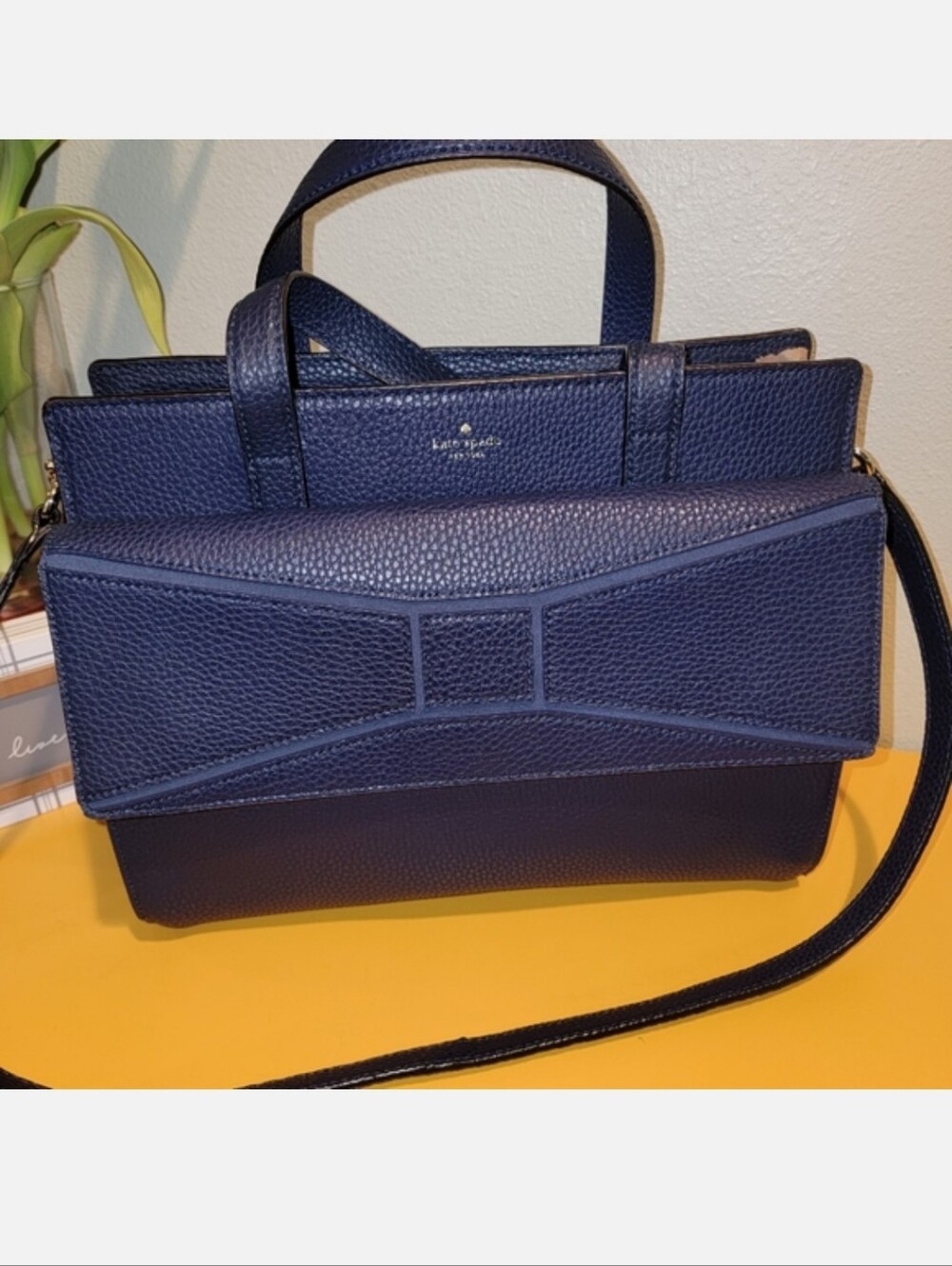 Kate Spade Navy pebbled leather bow-accent satchel
